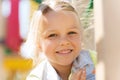 Happy little girl climbing on children playground Royalty Free Stock Photo