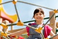 Happy little girl climbing on children playground Royalty Free Stock Photo