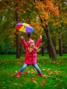 Girl with a colorful umbrella outdoor Royalty Free Stock Photo