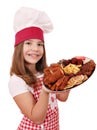 Little girl cook with mixed grilled meat on plate