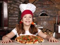 Happy little girl cook with pizza Royalty Free Stock Photo