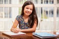 Happy little girl doing homework Royalty Free Stock Photo