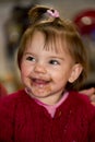 Happy little girl eating chocolate Royalty Free Stock Photo