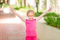 Happy little girl with face art paint in the park. Royalty Free Stock Photo