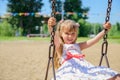 Happy little girl five years old wearing summer dress having fun Royalty Free Stock Photo