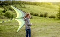 Happy little girl flying bright kite Royalty Free Stock Photo