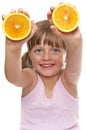 Happy little girl with fresh orange Royalty Free Stock Photo