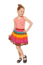 Happy little girl full lenght in colorful skirt, isolated on white background Royalty Free Stock Photo