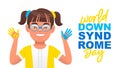 Happy little girl with glasses stained her palms with yellow and blue paint. World Down Syndrome Day. Sunny child Royalty Free Stock Photo