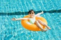 Happy little girl having fun in swimming pool Royalty Free Stock Photo