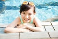 Happy little girl having fun in swimming pool Royalty Free Stock Photo