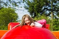 Happy Girl on Inflate Castle Royalty Free Stock Photo
