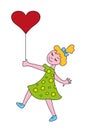 Happy little girl with a heart-shaped balloon Royalty Free Stock Photo