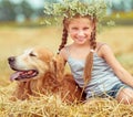 Happy little girl with her dog