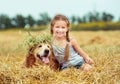 Happy little girl with her dog