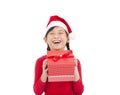 Happy little girl holding christmas gift Royalty Free Stock Photo
