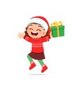 Happy little girl holding present for christmas Royalty Free Stock Photo