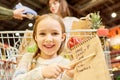Happy Little Girl Holding Shopping List Royalty Free Stock Photo