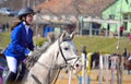 Happy little girl horseback rider Royalty Free Stock Photo