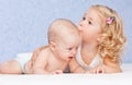 Happy little girl hugging kissing brother Royalty Free Stock Photo