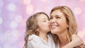 Happy little girl hugging and kissing her mother Royalty Free Stock Photo