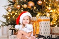 Happy little girl hugs her favorite toy in the room Royalty Free Stock Photo