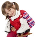 Happy little girl with ice skates