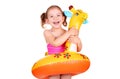 Happy little girl with inflatable rubber