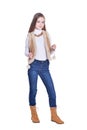 Happy little girl in jeans posing on white background Royalty Free Stock Photo