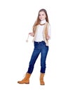 Happy little girl in jeans posing on white background Royalty Free Stock Photo