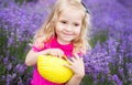 Happy little girl is in a lavender field Royalty Free Stock Photo