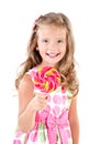 Happy little girl with lollipop isolated Royalty Free Stock Photo