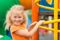 Happy little girl on the playground Royalty Free Stock Photo