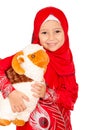 Happy little girl playing with her sheep toy - celebrating Eid u