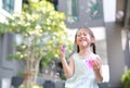Happy little girl playing soap bubbles in garden Royalty Free Stock Photo