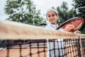 Happy little girl playing tennis. Summer sport Royalty Free Stock Photo