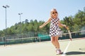 Happy little girl playing tennis Royalty Free Stock Photo