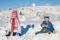 Happy little girl playing on winter snow day. Royalty Free Stock Photo