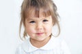 Happy little girl portrait on white background