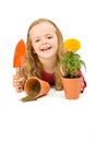 Happy little girl with potted flower Royalty Free Stock Photo