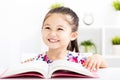 Happy little girl Reading Book Royalty Free Stock Photo