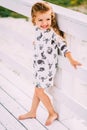 Happy little girl running on a beach Royalty Free Stock Photo