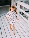 Happy little girl running on a beach Royalty Free Stock Photo