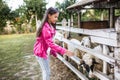 Happy little girl spend the weekend in the countryside