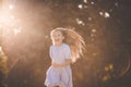 Happy little girl spending time in nature