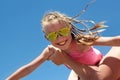 Happy little girl in a Sunny yellow glasses Royalty Free Stock Photo