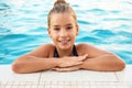 Happy little girl in swimming pool Royalty Free Stock Photo