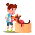 Happy Little Girl Takes Out Of Gift Box A Dog Vector. Isolated Illustration Royalty Free Stock Photo