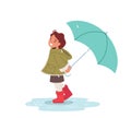 Happy Little Girl with Umbrella Walk on Street. Little Baby Character in Rubber Boots Stand in Puddle. Cheerful Child Royalty Free Stock Photo