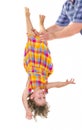 Happy little girl upside down Royalty Free Stock Photo